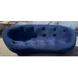 A contemporary blue upholstered Ploum Ligne Roset sofa (W249cm SH39cm D100cm)