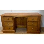 A pine dressing table flanked on both side by three drawers (D44cm W154cm H76cm)