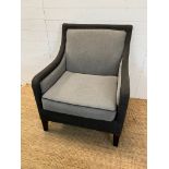 An upholstered arm chair