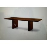 A contemporary hardwood plank dining table (W220cm D100cm H73cm)