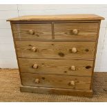 A pine chest of drawers, two over three (H92cm W90cm D45cm)