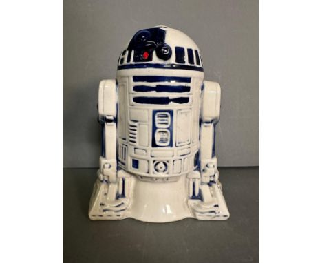 A ceramic Star Wars R2D2 money box Condition Report hairline cracks to head
