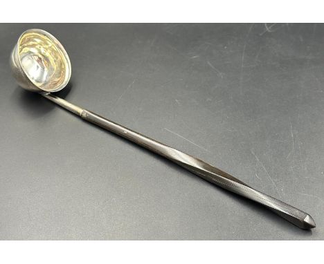 A Georgian silver toddy ladle on ebonised handle, approximate length 21cm