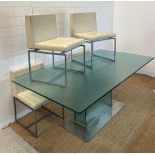 A set of four Clacci Kreaty "Claire" chairs and a large designer glass table