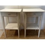 A pair of white single drawer bedsides with shelf under (H70cm W46cm D35cm)