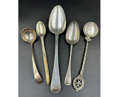 A selection of silver cutlery to include a sauce ladle, marrow spoon, coin spoon with twisted handle, teaspoon and tablespoon