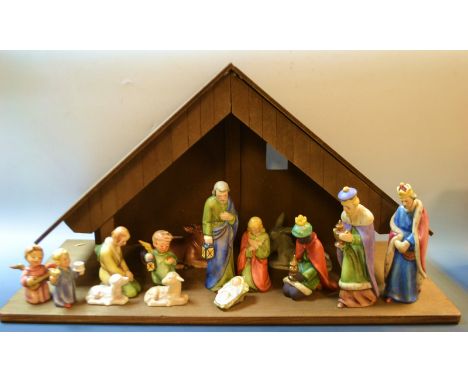 A Goebel 'Hummell' nativity scene, comprising Mary, Joseph, baby Jesus, Three Wise Men, Inn Keeper, Cow, Donkey and Lamb, tog