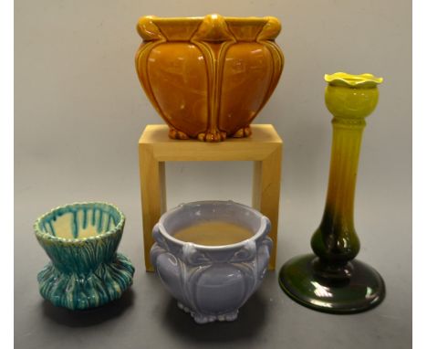 A Bretby candlestick, glazed in merging tones of green and yellow, 22cm high; a Bretby compressed ovoid jardiniere, 9cm high,