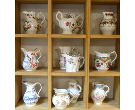 A set of twelve Royal Worcester miniature collector's jugs, based on traditional patterns and shapes