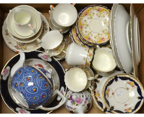 Tea Ware - an Art Deco six-setting tea service, comprising tea cups and saucers, side plates, milk jug and sugar bowl;  a blu
