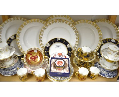 A set of six Royal Crown Derby Heraldic Border dinner plates; a pair of blue and gold Avesbury coffee cans and saucers; Vine 