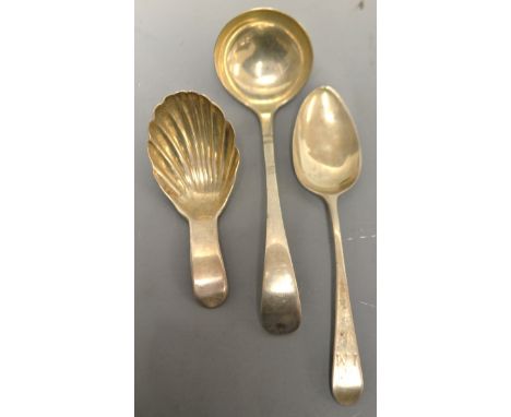 A George III shell bowl caddy spoon, London 1804; a teaspoon, London 1799; a sauce ladle, Sheffield 1911 (3)