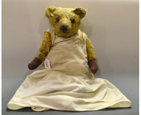 An early 20th century mohair jointed bear, horizontally stitched nose, small ears, 51.5cm high, c.1920