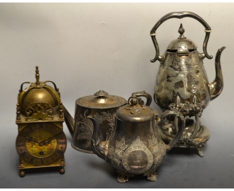 Metalware - a brass lantern clock; an aesthetic movement Britannia metal spirit kettle on stand; teapot; etc (4)