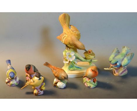 A Royal Worcester model kingfisher, robin, bull finch, marsh tit, blue tit, hedge sparrow; a Crown Staffordshire model flycat