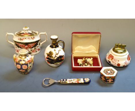 A Derby Crown porcelain ovoid bottle vase, single handle, year cypher 1891;  a Royal Crown Derby Imari sucrier and cover; a 1