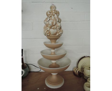 A selection of graduated ceramic bowls and fruit basket 