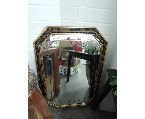 A large modern hall way mirror with gilt and painted framed in a leaded light style