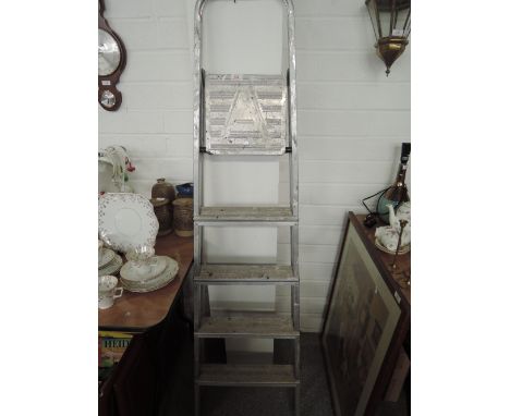 A set of aluminium step ladders 