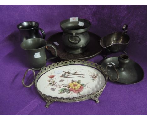 A selection of pewter and lustre style ceramics including tile tray