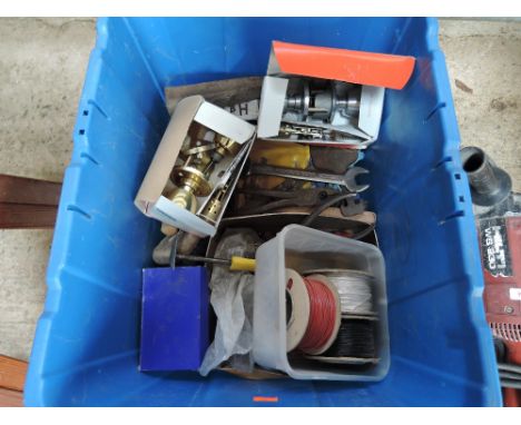 A box of various tools and door furniture