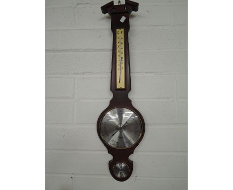 A vintage barometer with banjo style design named Clevedon 