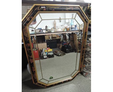 A large modern hall way mirror with gilt and painted framed in a leaded light style