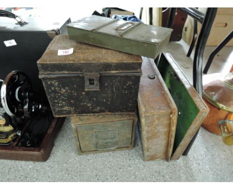 A selection of vintage tin trunks boxes and chests