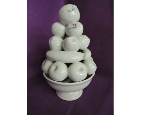 A vintage white glaze ceramic fruit bowl