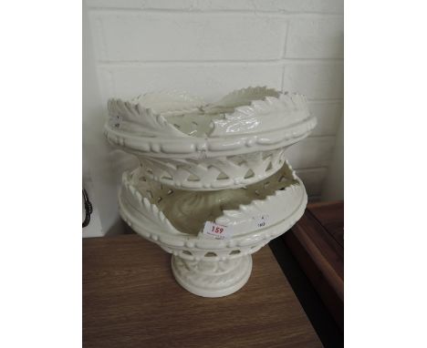 A set of two ceramic white glazed stands or planters
