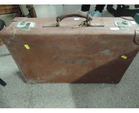 A vintage leather bound trunk suitcase with JWO initials 