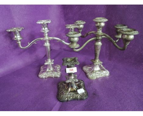 A selection of vintage plated candle sticks 