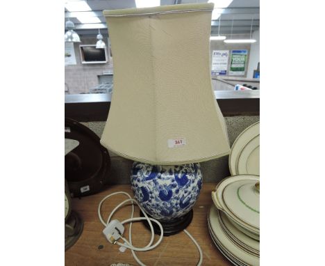 A table top with ceramic blue and white Chinese style base