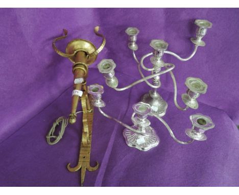A vintage cast metal wall bracket light fitting