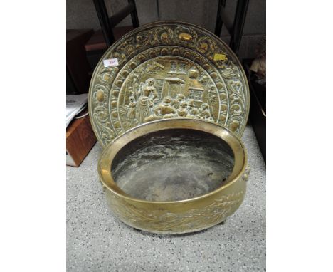 An antique brass planter with Scottish thistle, lion head motif and eagle claw and ball feet