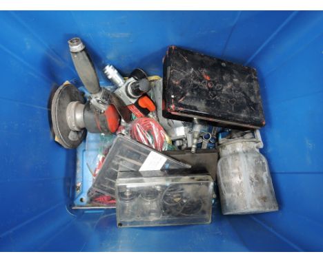 A box of various work tools, including spray guns etc