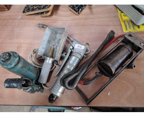 A Jack, inspection light, footpump and grease gun