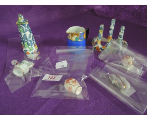 A selection of vintage miniature ceramics including salt and toast rack