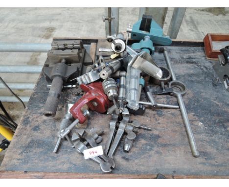 A selection of tools including small vices, precision vice etc