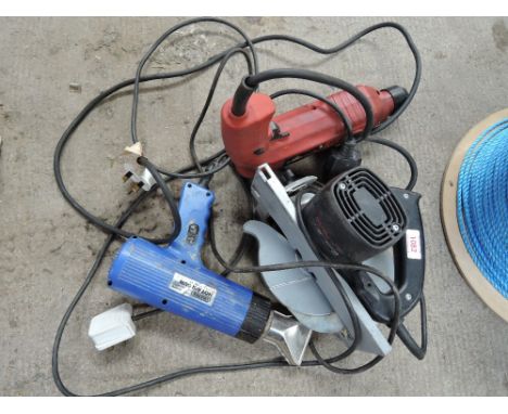 A selection of power tools including drills, paint stripper, saw