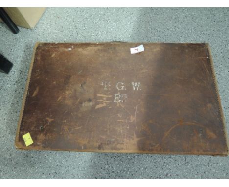 A vintage childs travel trunk suitcase leather bound with TGW initials 
