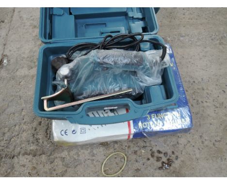 An as new Marksman power tools 3 function hammer drill and a Marksman power tools electric plane