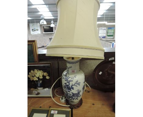 A table top with ceramic blue and white Chinese style base