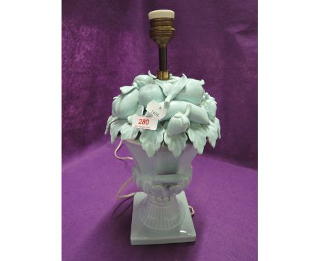 A vintage ceramic table lamp with baby blue glaze