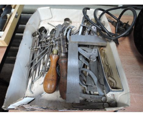 A Box of gauges, calipers, set squares and other measuring tools