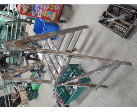 A set of wooden step ladders