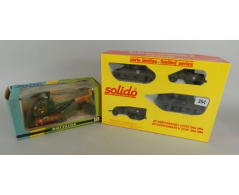 A Britains Hughes 800C 9761 helicopter, and a Solido 40th Anniversary boxed artillery set. (2)