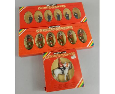 Various Britains metal model figures, comprising 7302 US Marine Sergeant, 7245 Gordon Highlanders and a single 7247 Lifeguard
