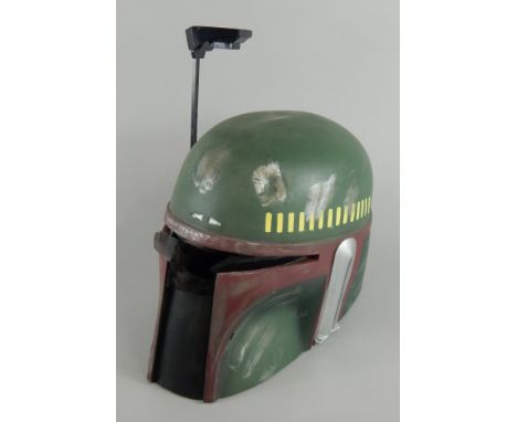 A 1995 Lucasfilm Boba Fett rubber helmet, 33cm high.