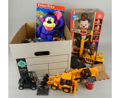 A collection of toys, to include a Mystery Action Bump-N-Go clown (boxed), a remote controlled fork lift truck and other chil